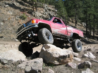 Carnage Canyon - Showing off that solid axle under Zach's 86 Toy