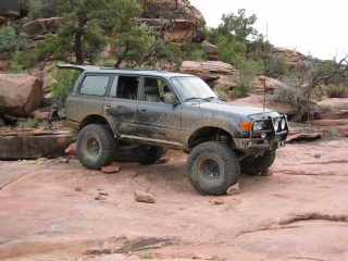 Behind the Rocks - Shawn holdin Zach in place