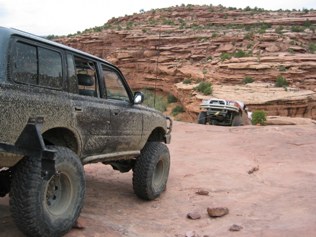 Behind the Rocks - Shawn winching Zach